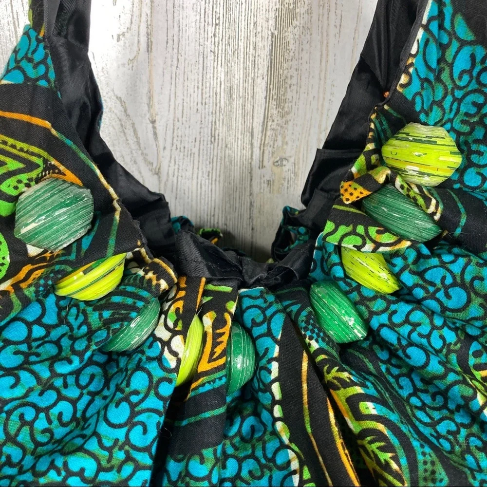handmade travel hobo bag with paper bead design